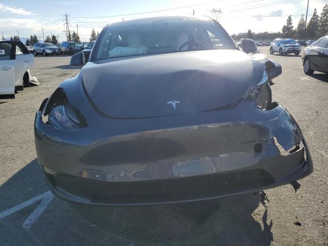 Photo 5 from auction – 2023 TESLA MODEL Y with VIN 7SAYGAEE7PF583075
