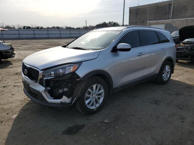 KIA SORENTO LX 2016 with VIN 5XYPG4A50GG110112 - Photo from auction