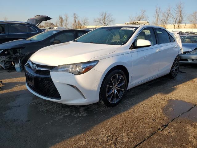 TOYOTA CAMRY LE 2017 with VIN 4T1BF1FK0HU696333 - Photo from auction