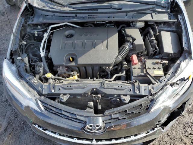 Photo 11 from auction – 2014 TOYOTA COROLLA L with VIN 2T1BURHE0EC112988