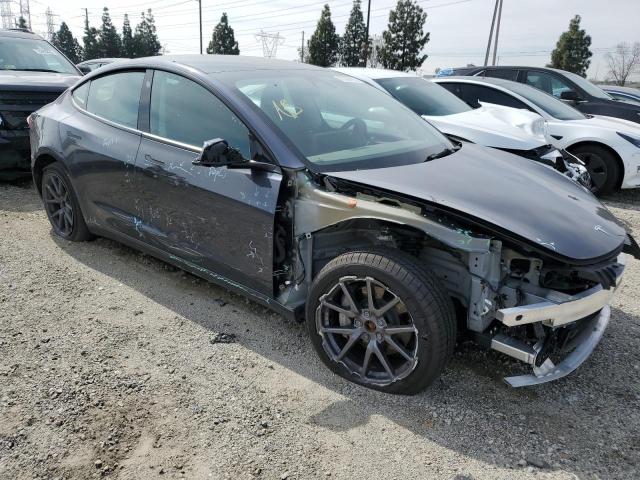 Photo 4 from auction – 2022 TESLA MODEL 3 with VIN 5YJ3E1EBXNF136529