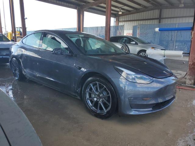Photo 4 from auction – 2023 TESLA MODEL 3 with VIN 5YJ3E1EA1PF663126