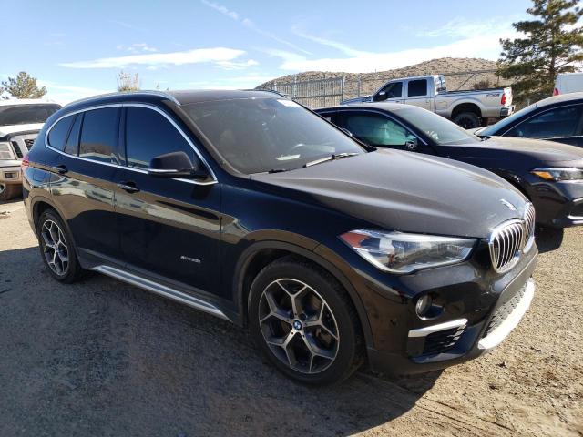 Photo 4 from auction – 2017 BMW X1 XDRIVE2 with VIN WBXHT3Z31H4A65054