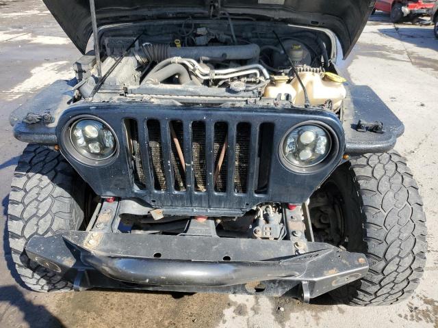 Photo 11 from auction – 2004 JEEP WRANGLER / with VIN 1J4FA69S74P762585
