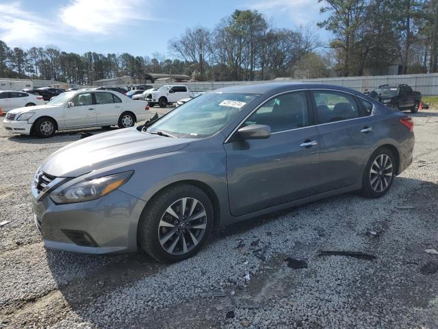 NISSAN ALTIMA 2.5 2017 with VIN 1N4AL3AP9HC268036 - Photo from auction
