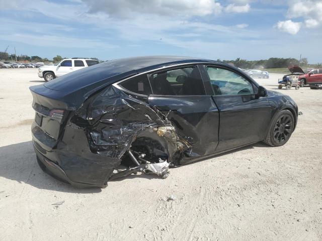 Photo 3 from auction – 2023 TESLA MODEL Y with VIN 7SAYGAEE7PF707734