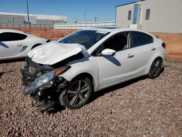 KIA FORTE EX 2018 with VIN 3KPFN4A81JE180556 - Photo from auction