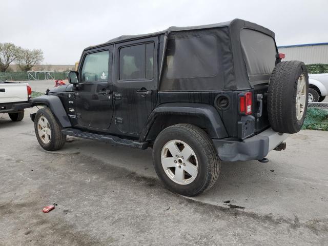 Photo 2 from auction – 2011 JEEP WRANGLER U with VIN 1J4BA5H13BL638867