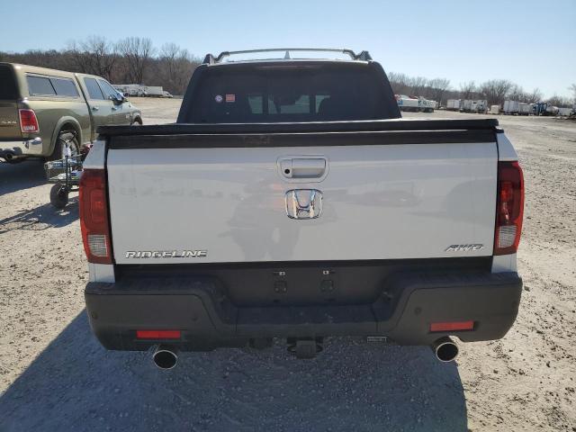 Photo 6 from auction – 2023 HONDA RIDGELINE with VIN 5FPYK3F84PB021111