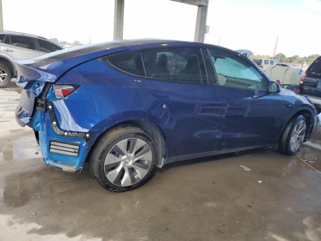 Photo 3 from auction – 2023 TESLA MODEL Y with VIN 7SAYGAEE2PF669815