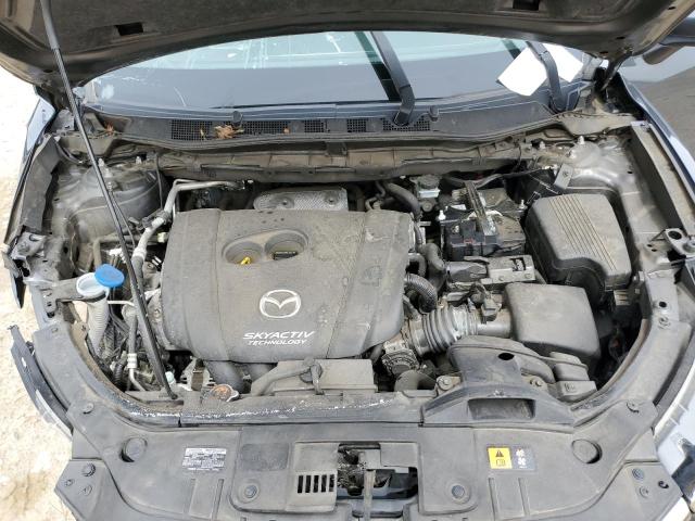 Photo 11 from auction – 2015 MAZDA CX-5 GT with VIN JM3KE2DY3F0446164
