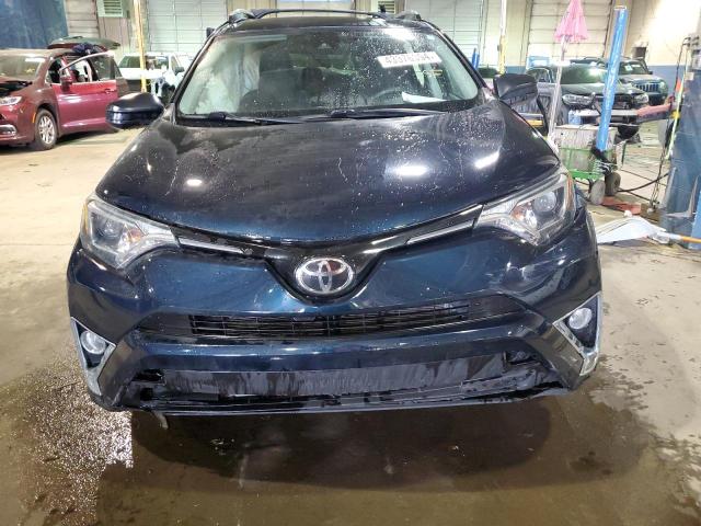 Photo 5 from auction – 2018 TOYOTA RAV4 LE with VIN 2T3BFREV0JW763164