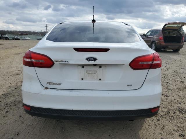 Foto 6 de la subasta – 2018 FORD FOCUS SE con VIN 1FADP3F29JL206964