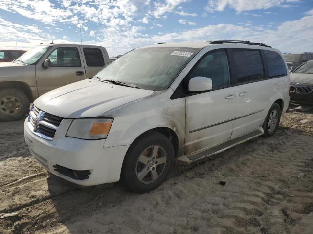 DODGE GRAND CARA 2010 with VIN 2D4RN5D19AR173079 - Photo from auction