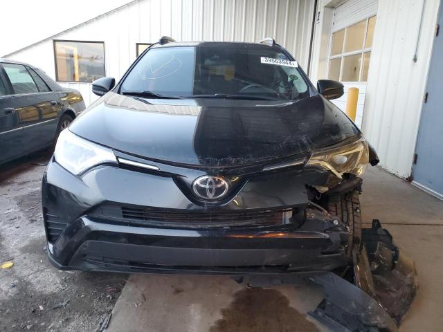 Photo 5 from auction – 2018 TOYOTA RAV4 LE with VIN 2T3BFREV6JW842676