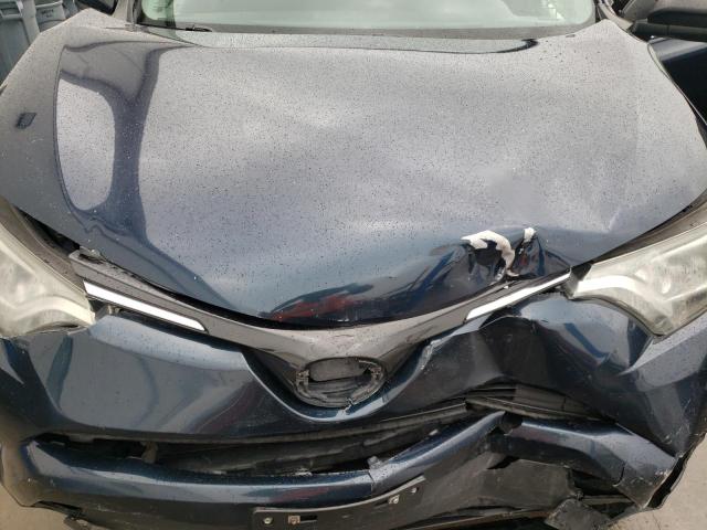 Photo 11 from auction – 2018 TOYOTA RAV4 LE with VIN JTMZFREV1JJ743566