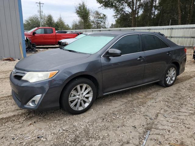 TOYOTA CAMRY HYBR 2012 with VIN 4T1BD1FK5CU013329 - Photo from auction