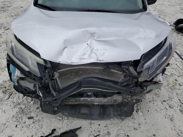 Photo 12 from auction – 2016 HONDA CR-V LX with VIN 2HKRM3H33GH518046