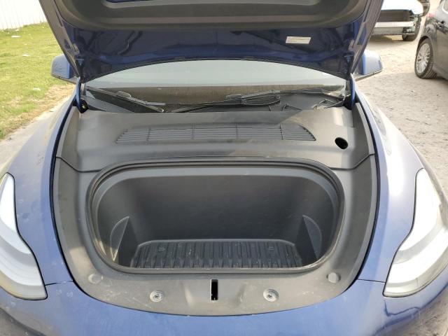 Photo 11 from auction – 2023 TESLA MODEL Y with VIN 7SAYGDEE4PF877034