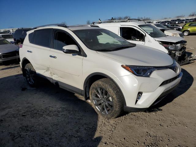 Photo 4 from auction – 2018 TOYOTA RAV4 LIMIT with VIN JTMDFREV0JJ257311