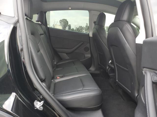 Photo 10 from auction – 2022 TESLA MODEL Y with VIN 7SAYGDEF0NF404379
