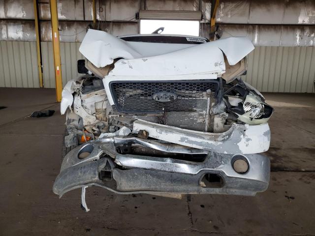 Photo 5 from auction – 2005 FORD F150 with VIN 1FTRF12W05NA21812
