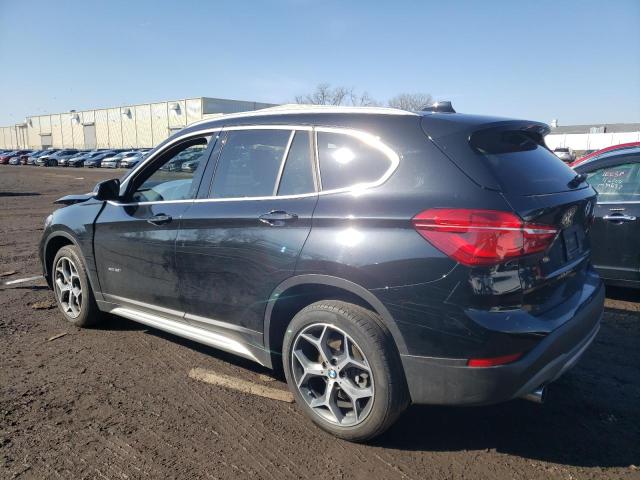 Photo 2 from auction – 2018 BMW X1 XDRIVE2 with VIN WBXHT3C39J5K25459