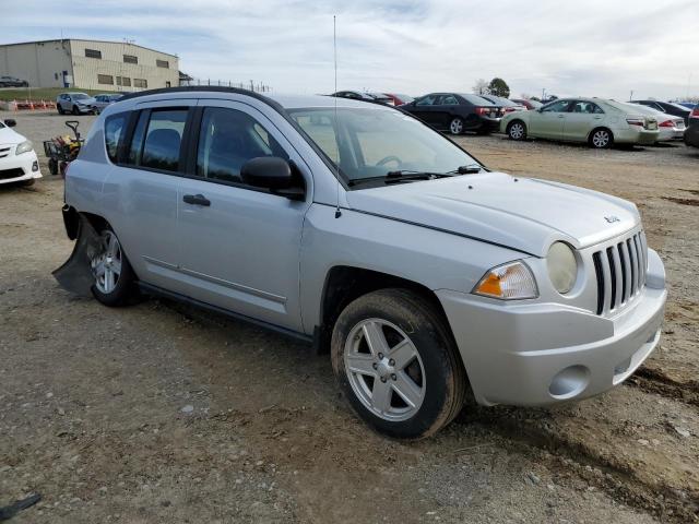 Photo 4 from auction – 2009 JEEP COMPASS with VIN 1J4FT47B59D102426
