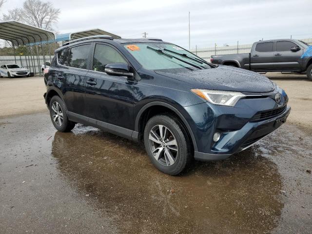 Photo 4 from auction – 2017 TOYOTA RAV4 XLE with VIN JTMWFREV5HD103243
