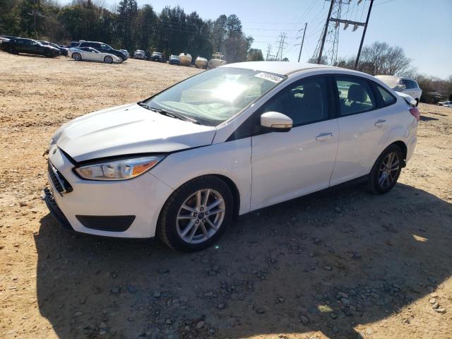 FORD FOCUS SE 2015 with VIN 1FADP3F24FL362255 - Photo from auction