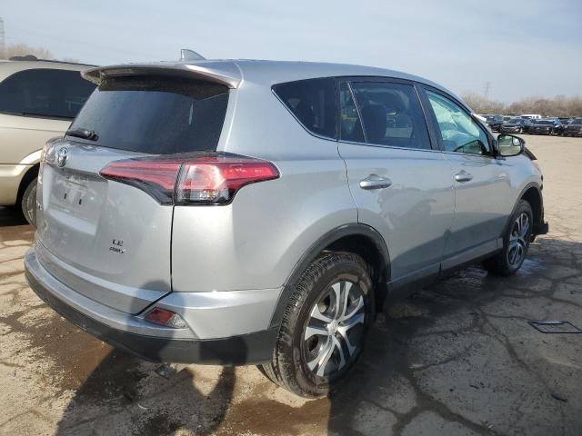 Photo 3 from auction – 2018 TOYOTA RAV4 LE with VIN 2T3BFREV8JW765129