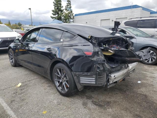 Photo 2 from auction – 2021 TESLA MODEL 3 with VIN 5YJ3E1EBXMF865032