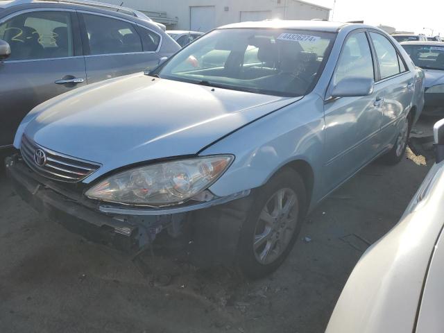 TOYOTA CAMRY LE 2005 with VIN 4T1BF32K15U609200 - Photo from auction