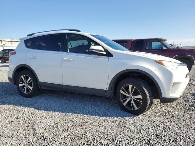 Photo 4 from auction – 2016 TOYOTA RAV4 XLE with VIN JTMRFREV8GJ080599