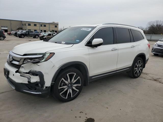 HONDA PILOT TOUR 2019 with VIN 5FNYF5H90KB037443 - Photo from auction