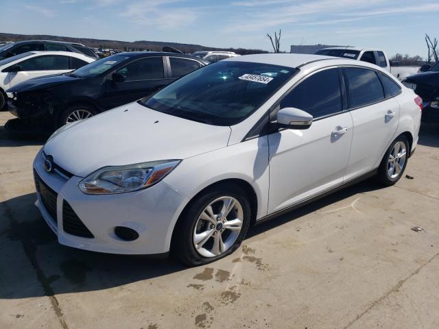 FORD FOCUS SE 2014 with VIN 1FADP3F21EL174971 - Photo from auction