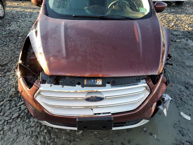 Photo 12 from auction – 2018 FORD ESCAPE SE with VIN 1FMCU9GD9JUA73839
