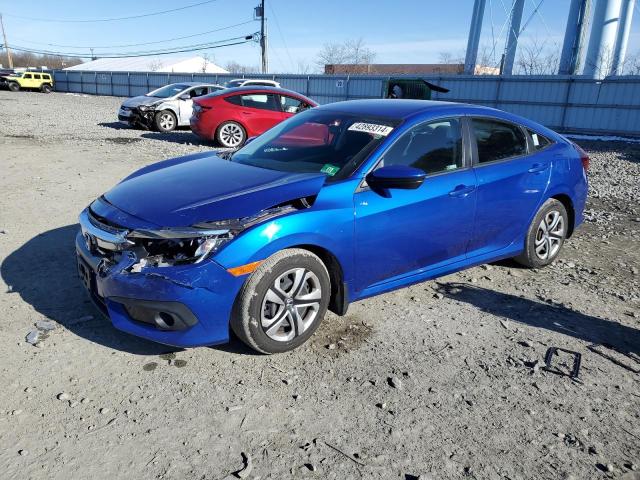 HONDA CIVIC LX 2018 with VIN 2HGFC2F66JH587408 - Photo from auction