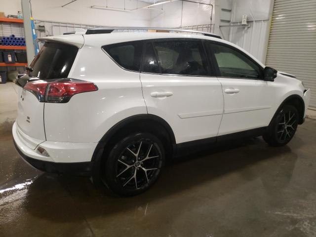 Photo 3 from auction – 2017 TOYOTA RAV4 SE with VIN JTMJFREV8HJ143764