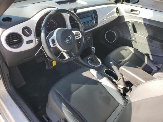 Photo 8 from auction – 2014 VOLKSWAGEN BEETLE with VIN 3VWJX7AT2EM616544