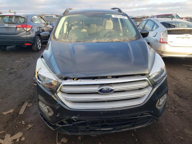 Photo 5 from auction – 2018 FORD ESCAPE SE with VIN 1FMCU0GD3JUA44154