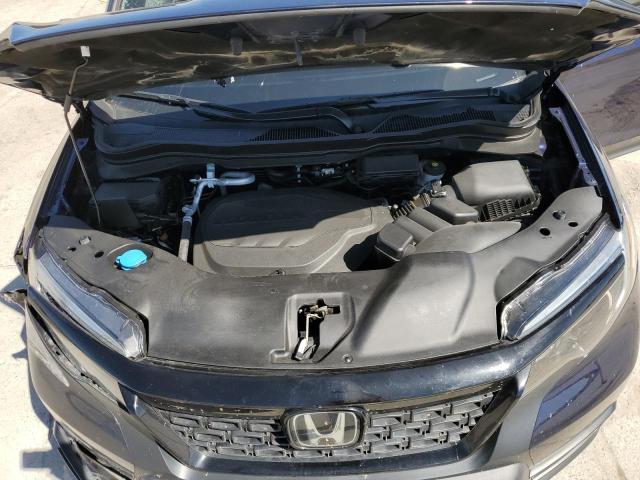 Photo 12 from auction – 2021 HONDA PASSPORT E with VIN 5FNYF7H58MB015993