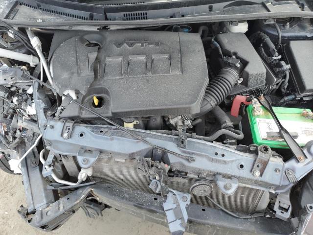 Photo 11 from auction – 2014 TOYOTA COROLLA L with VIN 5YFBURHE6EP073808