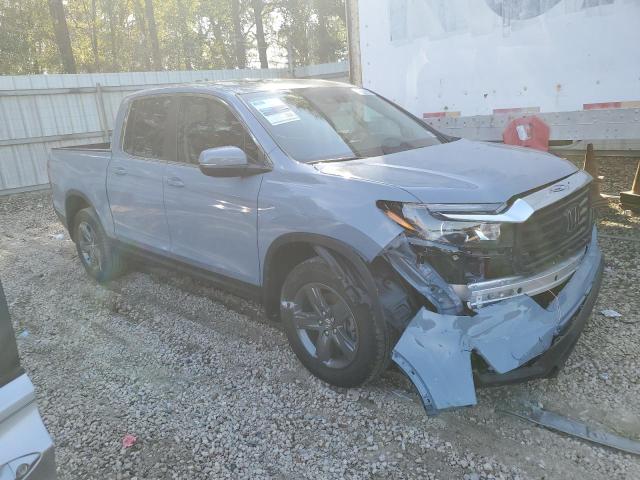Photo 4 from auction – 2023 HONDA RIDGELINE with VIN 5FPYK3F59PB036337