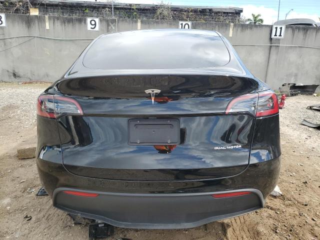 Photo 6 from auction – 2023 TESLA MODEL Y with VIN 7SAYGAEE6PF621251