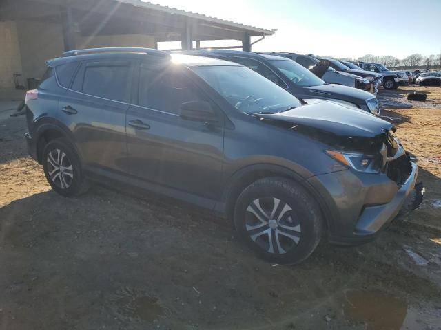 Photo 4 from auction – 2018 TOYOTA RAV4 LE with VIN JTMZFREV7JJ745449
