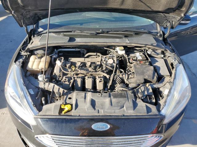 Photo 11 from auction – 2017 FORD FOCUS TITA with VIN 1FADP3N28HL320577