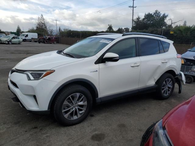 TOYOTA RAV4 HV LE 2018 with VIN JTMRJREV5JD257646 - Photo from auction