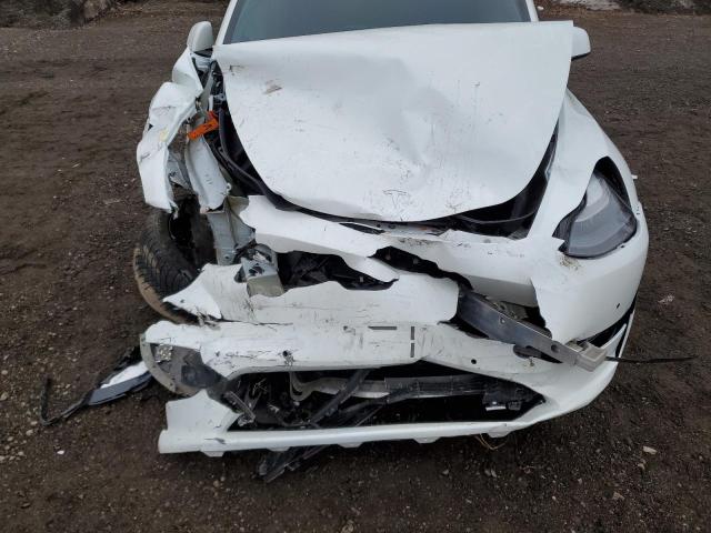 Photo 12 from auction – 2022 TESLA MODEL Y with VIN 7SAYGAEE3NF531830
