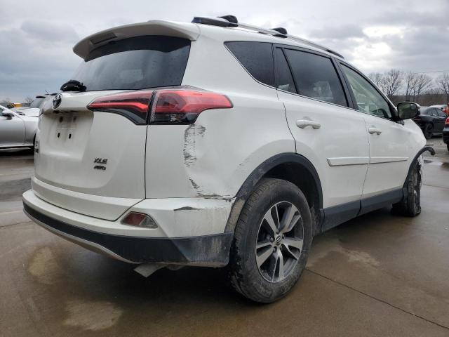 Photo 3 from auction – 2016 TOYOTA RAV4 XLE with VIN JTMRFREV9GJ057011